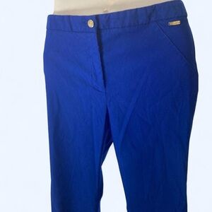 Calvin Klein vibrant blue pants with gold Calvin Klein logos 10